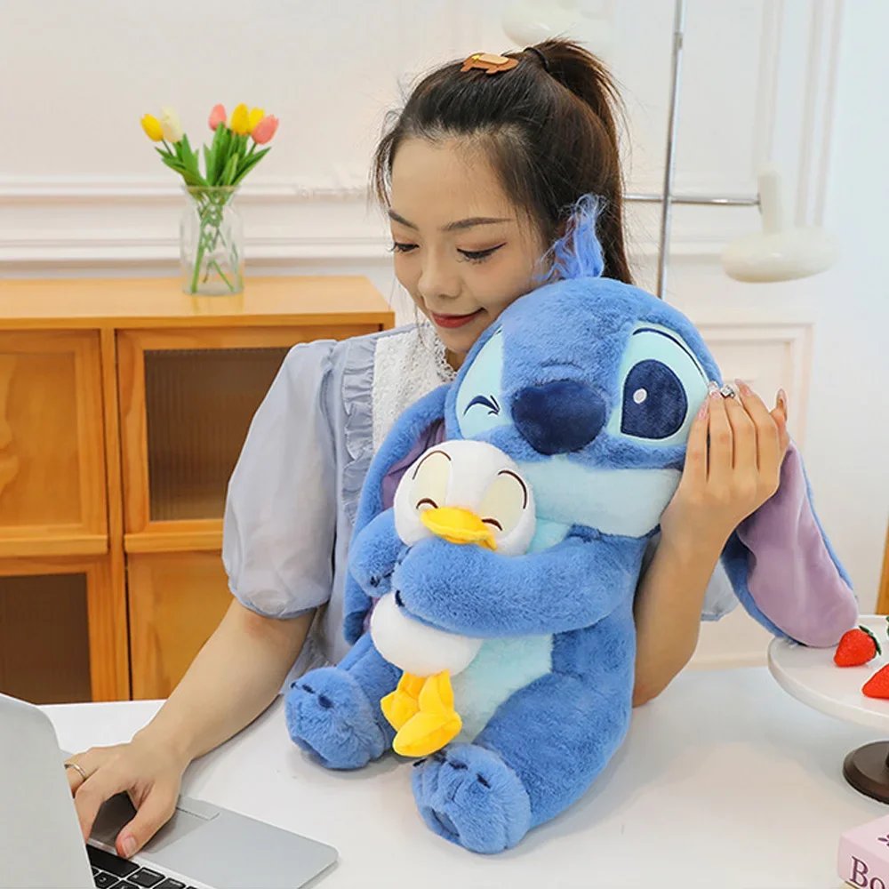 Disney lindo pato de peluche de costura juguete Kawaii dibujos animados Anime mu&ntilde;eco de peluche almohada para dormir juguete relajante regalos de cumplea&ntilde;os para ni&ntilde;os y ni&ntilde;as
