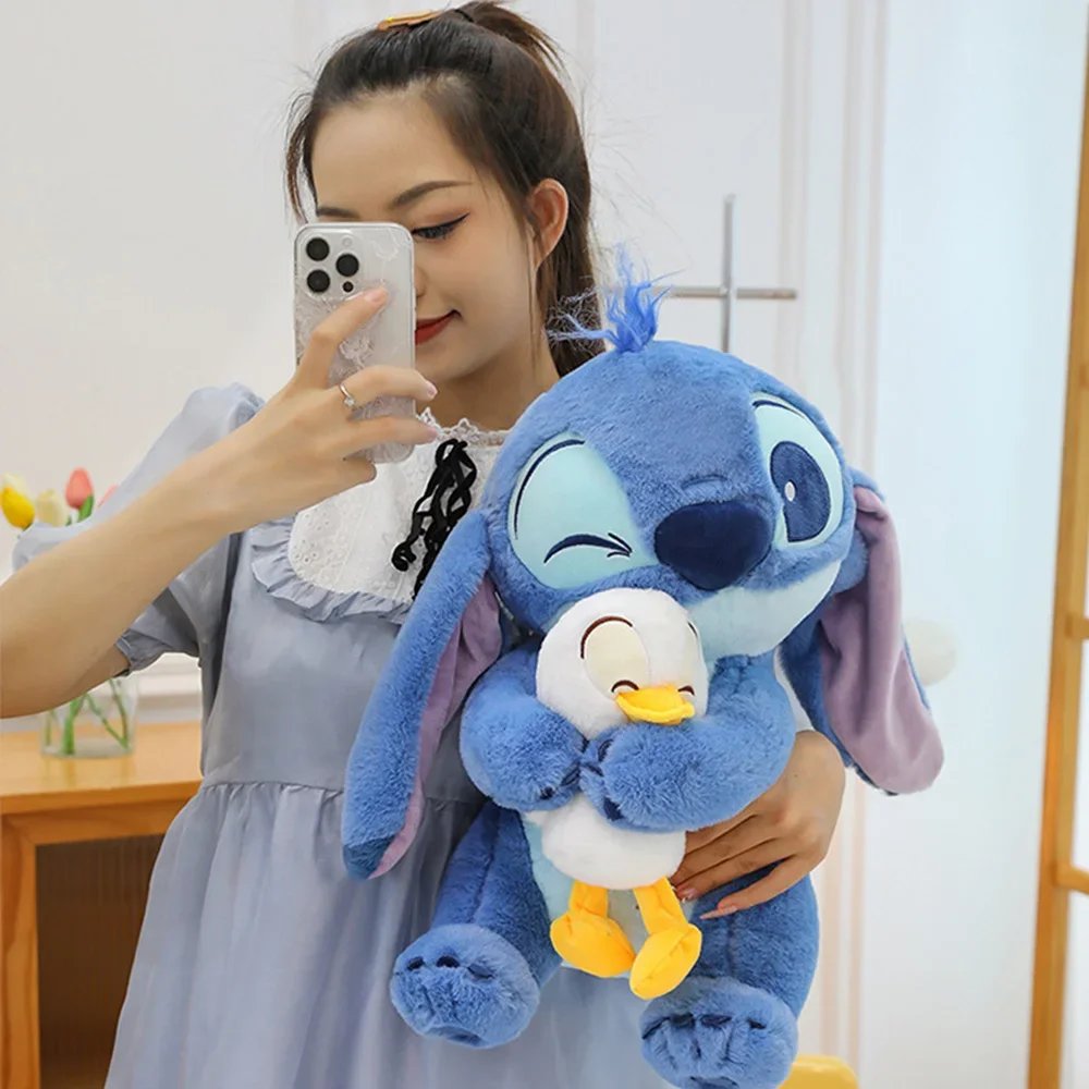 Disney lindo pato de peluche de costura juguete Kawaii dibujos animados Anime mu&ntilde;eco de peluche almohada para dormir juguete relajante regalos de cumplea&ntilde;os para ni&ntilde;os y ni&ntilde;as