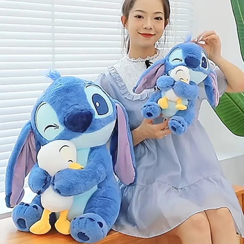 Disney lindo pato de peluche de costura juguete Kawaii dibujos animados Anime mu&ntilde;eco de peluche almohada para dormir juguete relajante regalos de cumplea&ntilde;os para ni&ntilde;os y ni&ntilde;as