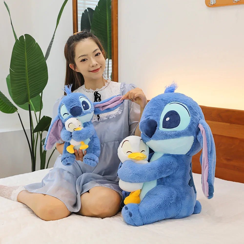 Disney lindo pato de peluche de costura juguete Kawaii dibujos animados Anime mu&ntilde;eco de peluche almohada para dormir juguete relajante regalos de cumplea&ntilde;os para ni&ntilde;os y ni&ntilde;as